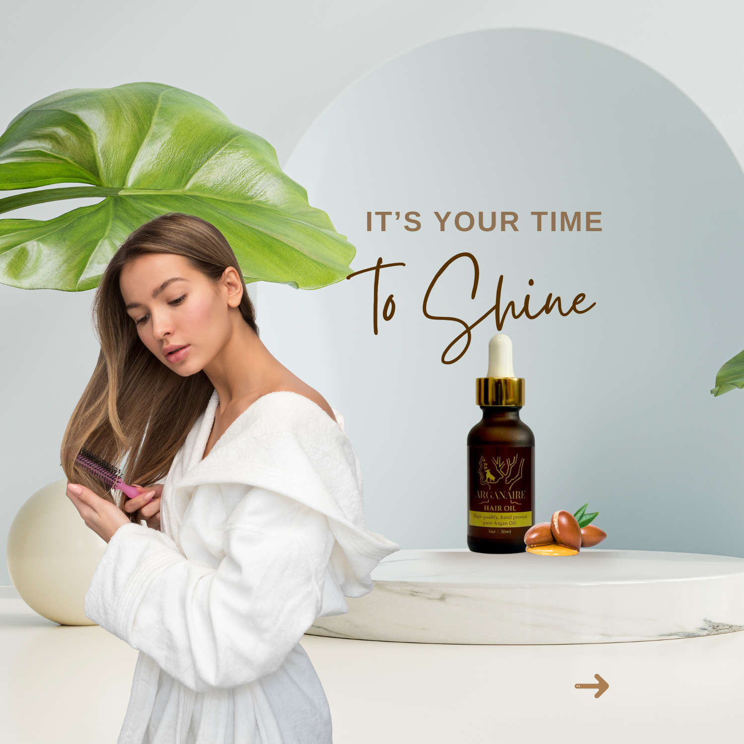 Woman brushing her hair beside an Arganaire Hair & Beard Oil bottle, promoting luxury Moroccan argan oil care with the message "It's Your Time to Shine".